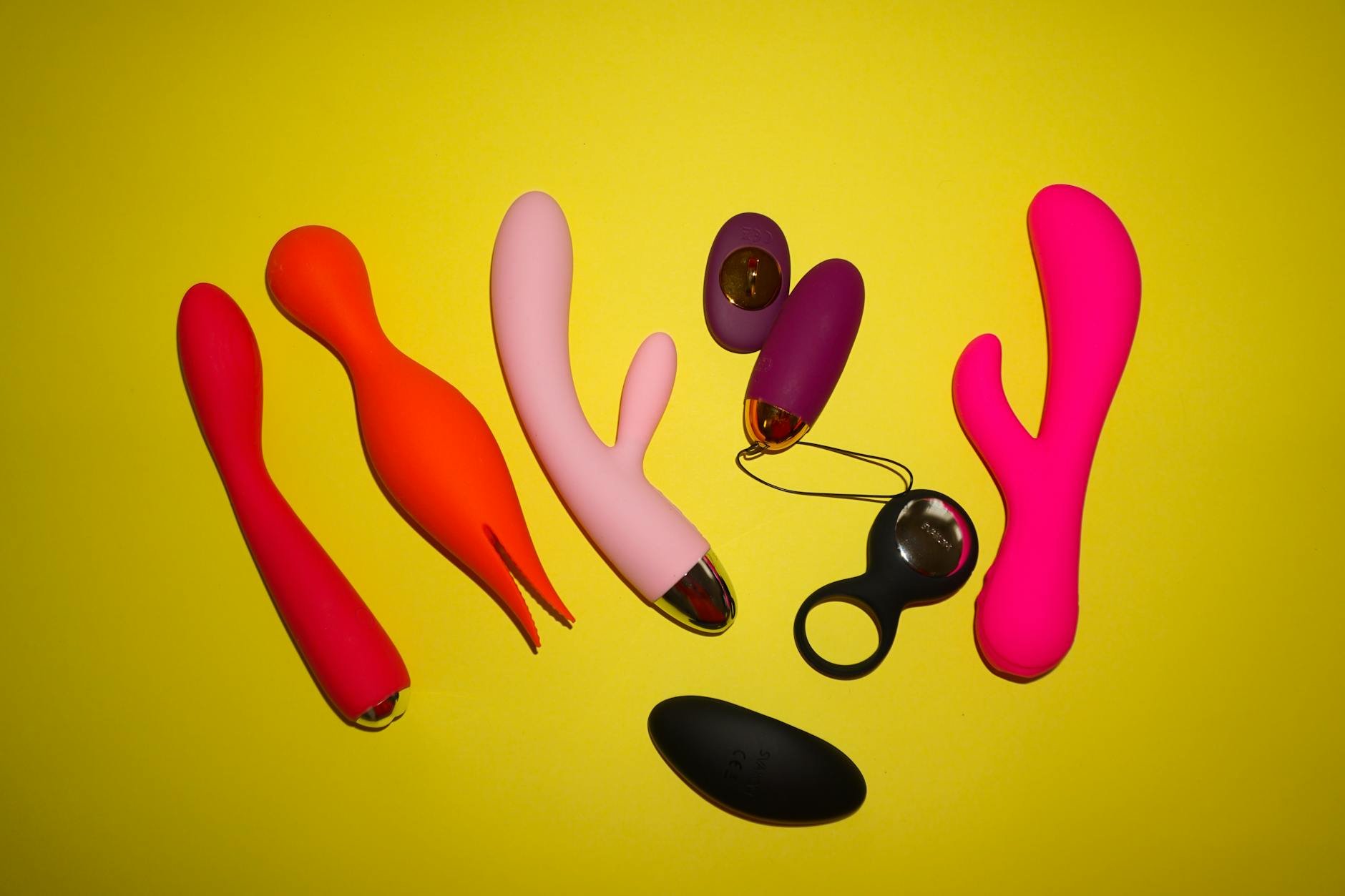 Hands holding a personal vibrator, expressing intimacy and personal pleasure